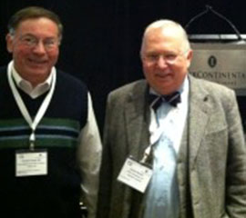 Following Dr. Holub's lecture to research physician investigators, Dr. Holub took time to pose with Dr. Claude Wischik (center), founder of TauRx Pharmaceuticals, who has spent 30 years developing potential treatments for Alzheimer's Disease.